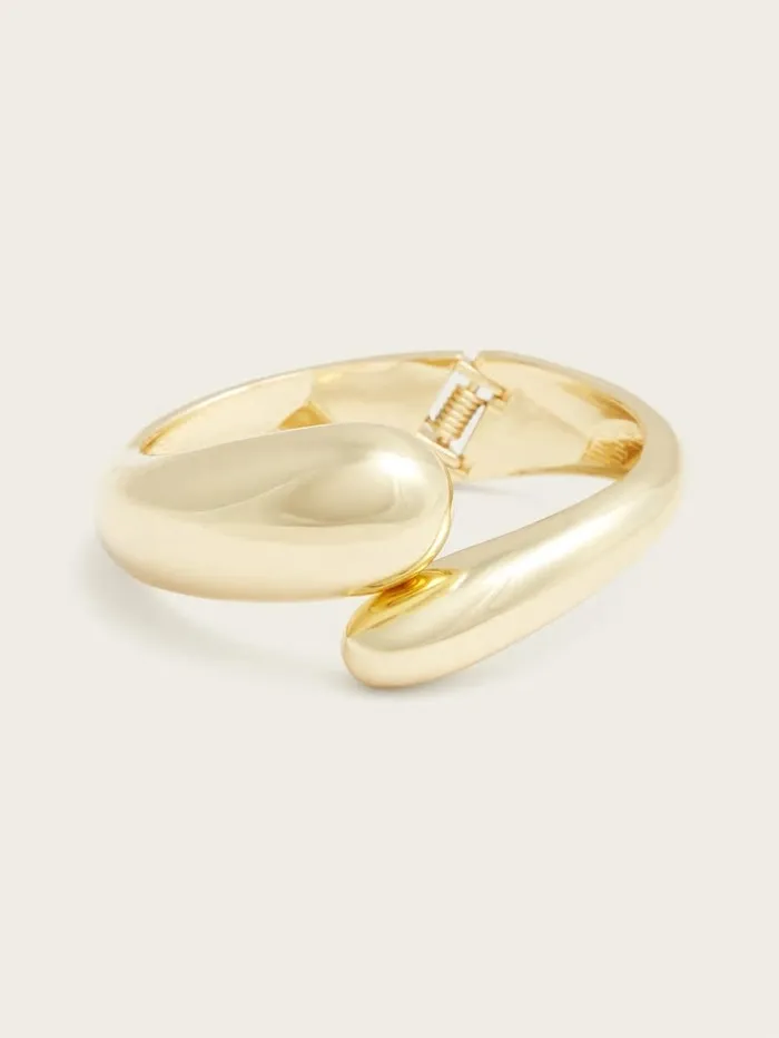 Jewelry GUESS Women GoldTone Swirl Bangle Bracelet SilverGold