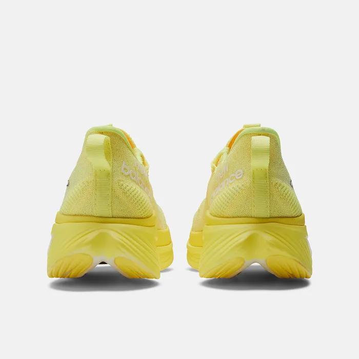 Women Running New Balance FuelCell SuperComp Elite v3 Cosmic Pineapple with White Iridescent and Dark Silver Metallic Women Running New Balance FuelCell SuperComp Elite v3 Cosmic Pineapple with White Iridescent and Dark Silver Metallic